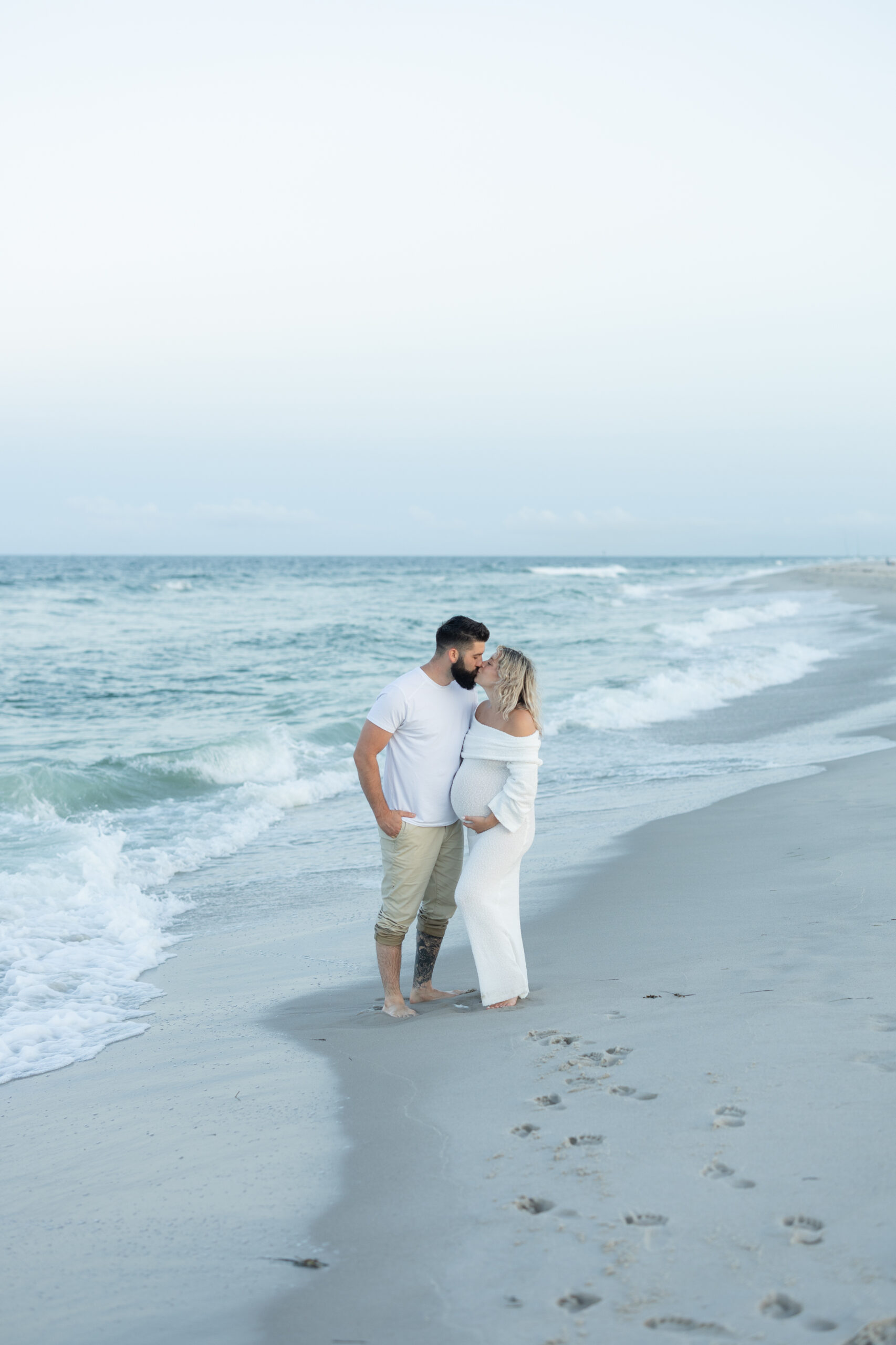 An image of a pregnant mama during her maternity session on Island Beach State Park. She was photographed by Natalie Beach Photography, a South Jersey Family Photographer.